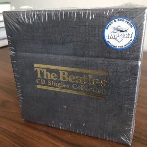 The Beatles CD Singles Collection, brand new, never opened.